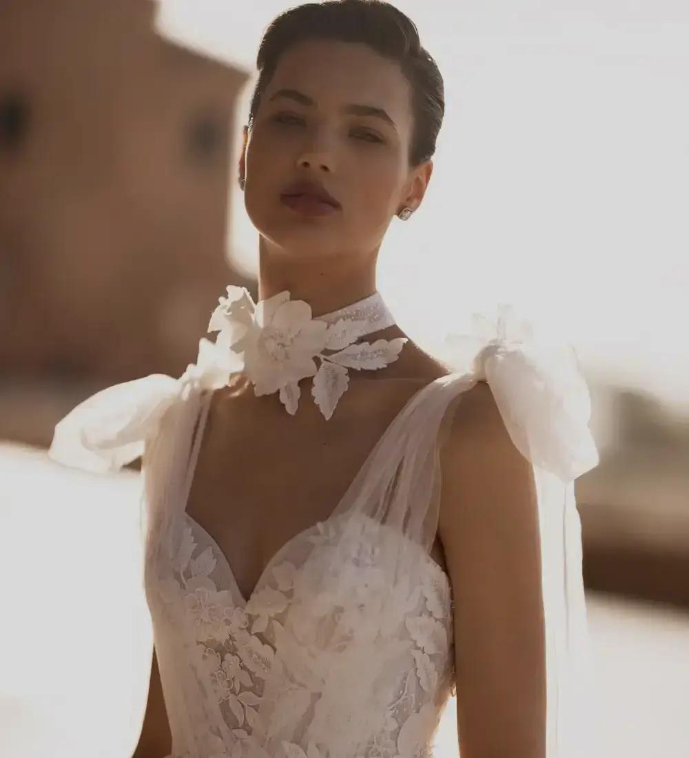 Model wearing a white Bohemian Style Gown