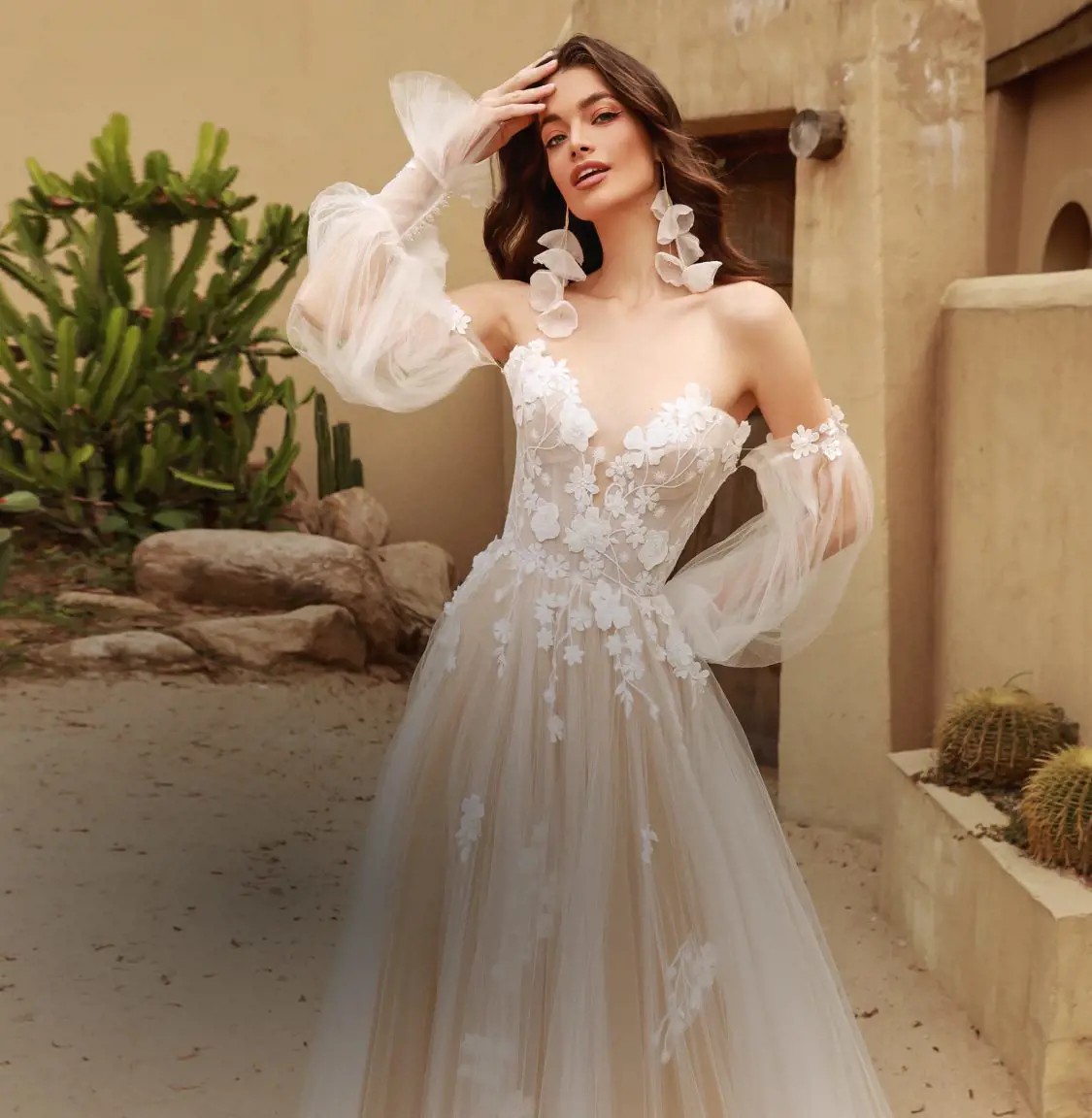 Model wearing a Lillian West Gown